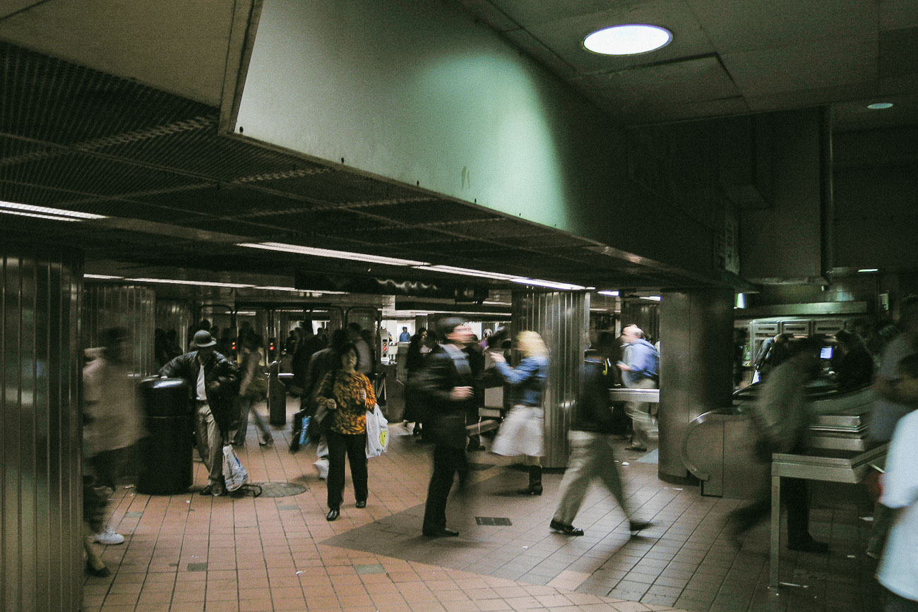 People walking through a New York City subway station in May 2005.