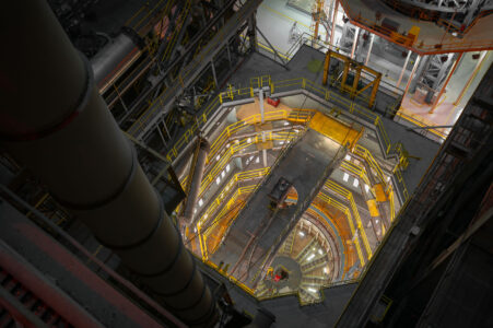 Looking down into the massive cleaning cell inside the Vertical Assembly Center at NASA Michoud Assembly Facility.

The massive washing facility is used to wash the insides of the Space Launch System(SLS) fuel tanks. The SLS rocket will be the world’s largest rocket ever built.