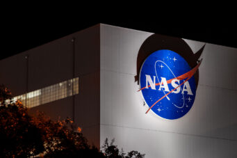 The NASA logo on the side of Michoud Assembly Facility where the Space Launch System (SLS) for Artemis is being built.
