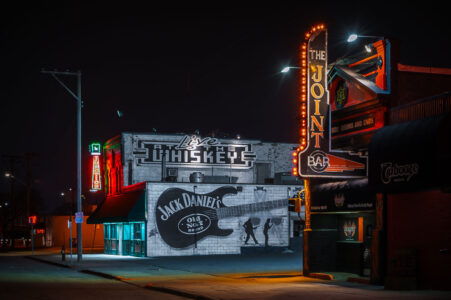A large Jack Daniels mural on the Whiskey Junction building on Cedar Avenue in Minneapolis. The bar has been closed since at least 2020