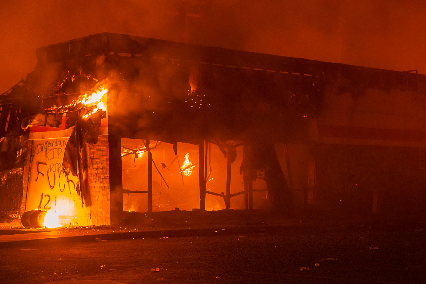 AutoZone store on fire during Minneapolis George Floyd protests