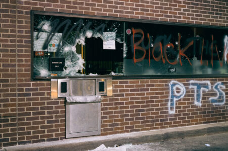 A broken into US Bank building on Lake Street during the 2nd day of protests in Minneapolis following the death of George Floyd.