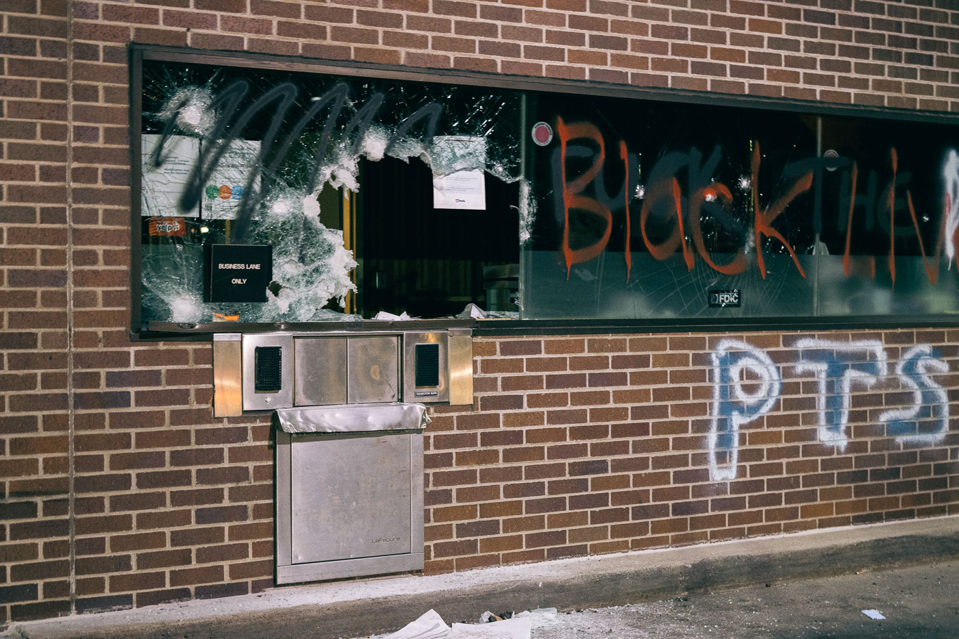 Broken drive through window at US Bank during George Floyd riots in Minneapolis