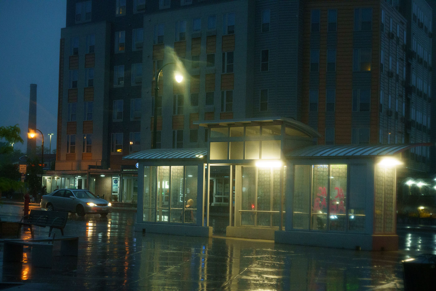 Bus shelter on a rainy night in Minneapolis