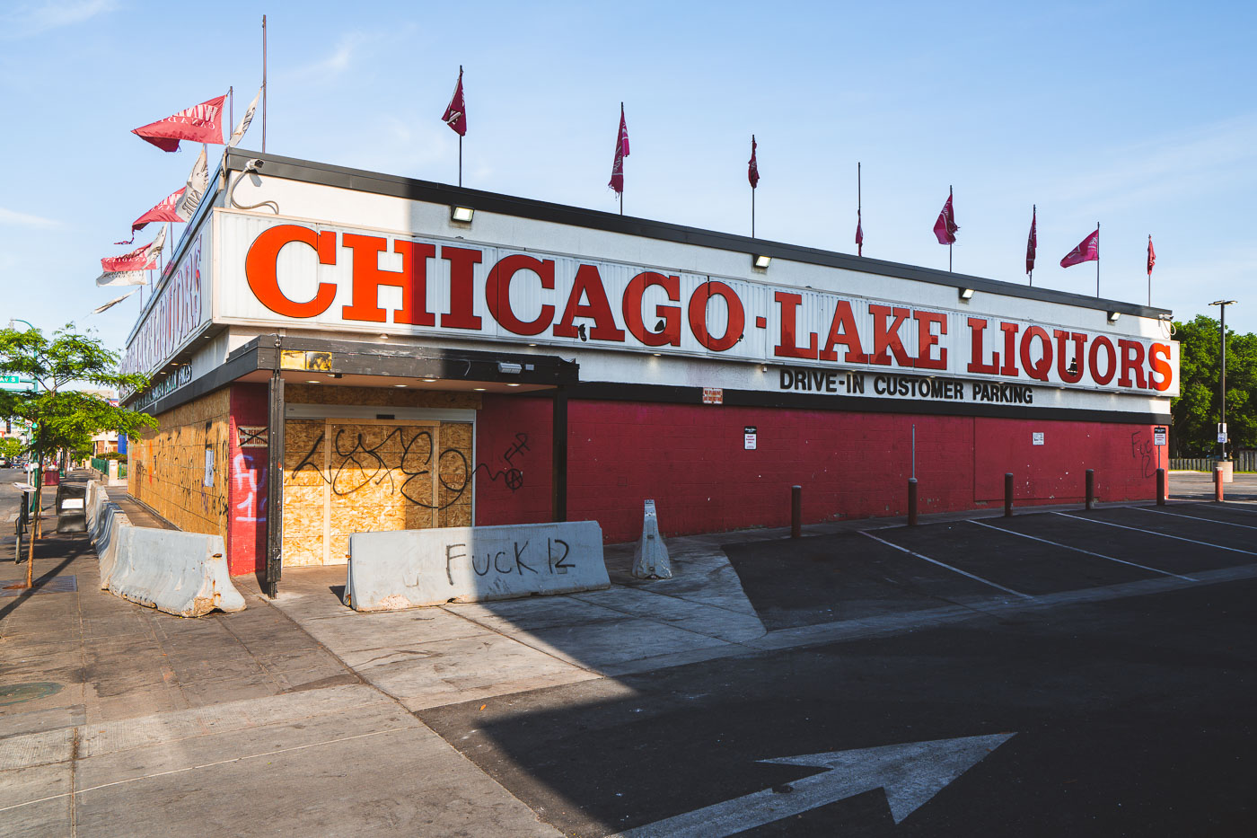 Chicago Lake Liquors with boards on it
