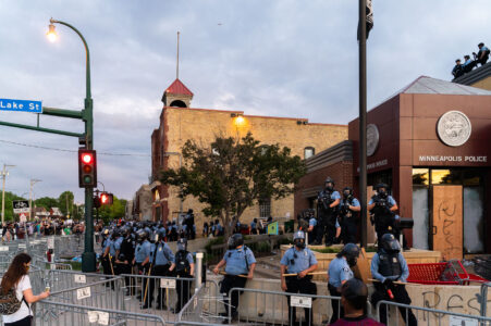 Minneapolis Police surround the 3rd Precinct during the 2nd day of protests in Minneapolis following the death of George Floyd.