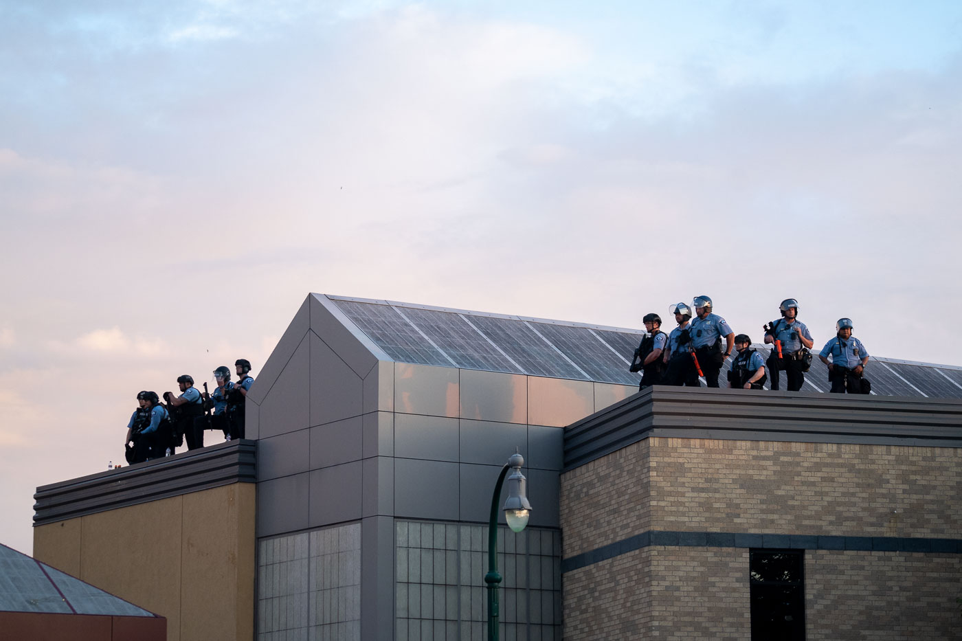 Minneapolis Police on top of police station