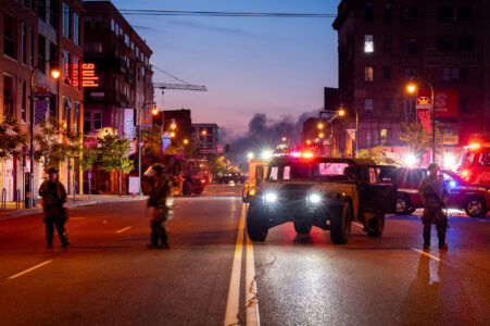 The Minnesota National Guard on Lake Street in Uptown Minneapolis on May 30, 2020 as the sunrises during the Minneapolis Uprising.