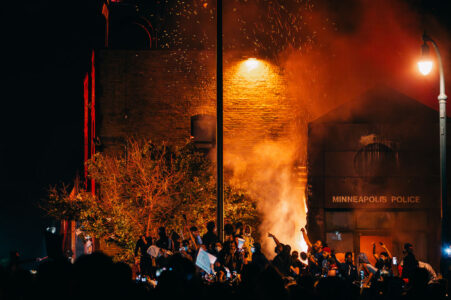 The Minneapolis Police 3rd Precinct on fire as protesters surround it after days of protest. 

The precinct was Derek Chauvin’s home precinct and was set ablaze after the police abandoned the precinct following days of protests over the death of George Floyd.