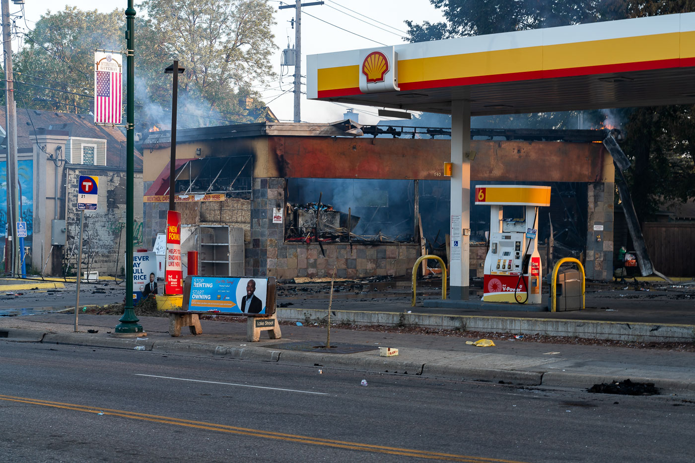 Shell gas station on fire on Lake Street as day breaks