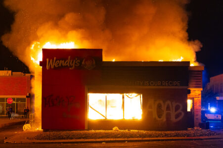 Wendy’s on fire on 26th Ave S during the 2nd day of protests in Minneapolis following the death of George Floyd.