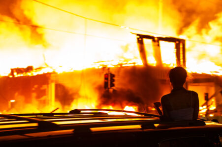 A 6-story new housing development on fire near the Minneapolis Police 3rd Precinct during the 2nd day of protests in Minneapolis following the death of George Floyd.