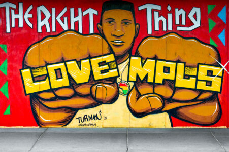 Mural located on Hennepin Avenue in Uptown Minneapolis by Adam Turman. The boards on Uptown Theatre read “Do the right thing” “Love MPLS” “Justice for George Floyd”.