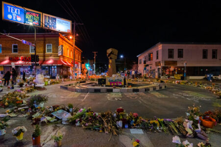 A circle of flowers around a raised fist at George Floyd Square on June 15, 2020. Floyd was killed by the Minneapolis Police the month prior.