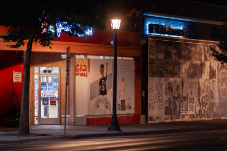Artwork covering boards on retail store on Hennepin Ave in Minneapolis. The boards were put up unrest in Minneapolis following the May 25th, 2020 death of George Floyd.