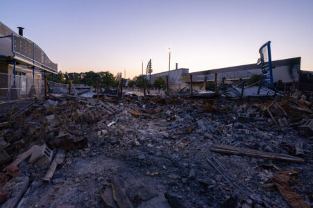 The rubble of a strip mall on Lake Street that burned during riots that followed the death of George Floyd in May 2020.