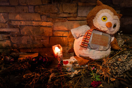 A stuffed owl with a note to Gianna, George Floyd's daughter, at the memorial at 38th and Chicago.