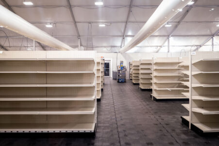 Empty shelving in a newly built “Community Market” that will serve as a temporary store while the damaged Cub Foods store is repaired. The store was damaged following the May 25th, 2020 death of George Floyd.