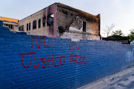No Justice No Peace! Written on what’s left of Chicago Furniture on Chicago Ave in Minneapolis. The store was burned in riots after the May 25th, 2020 death of George Floyd.