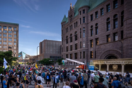 Protesters outside the Federal Courthouse in downtown Minneapolis. Protesters gathered on July 23rd, 2020 to protest federal officers being deployed to cities around the country.