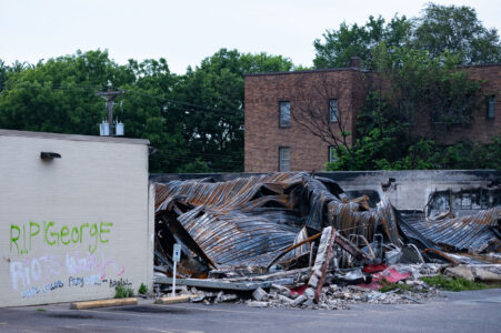 The rubble of the O'Reilly Auto Parts store on Nicollet Avenue. The store was burned after the May 25th, 2020 death of George Floyd.

ACAB, Fuck Jacob Frey, Fuck 12, RIP George and Riots work written on the remaining wall