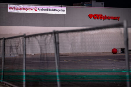 A sign reading “We’ll stand together and we’ll build together” on a Target Store with CVS Pharmacy on East Lake Street in Minneapolis. The store was heavily looted during the 2020 unrest in Minneapolis following the May 25th death of George Floyd.