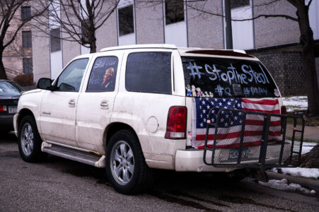 A truck with “Stop The Steal” and Qanon written on the windows found outside a “Stop The Steal” rally at the Minnesota State Capitol on November 14, 2020.