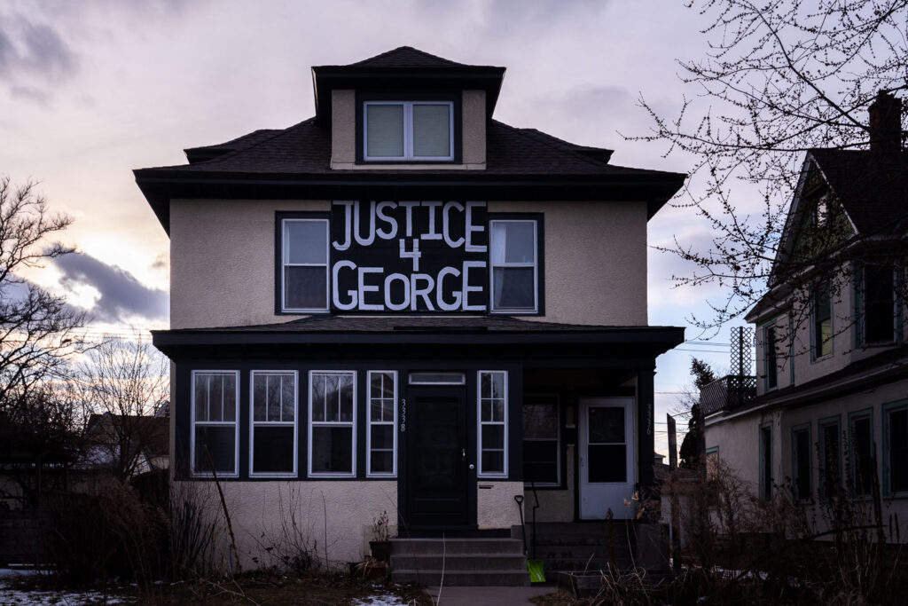 A sign reading "Justice 4 George" on a home in South Minneapolis.