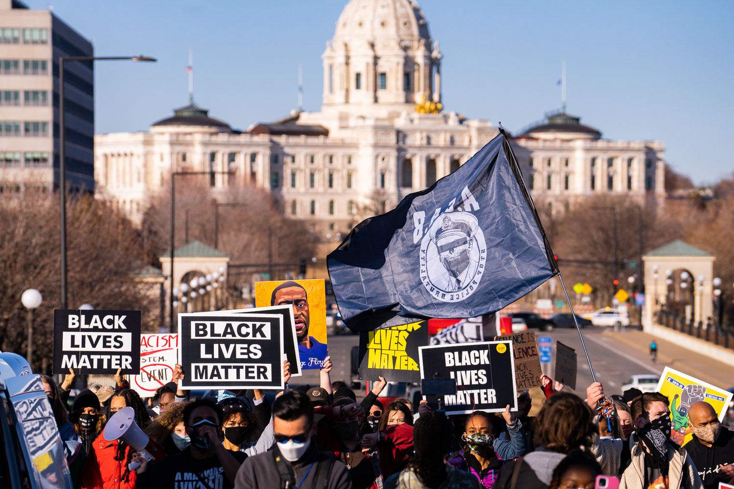 Protesters march near the Minnesota State Capitol demanding justice for George Floyd as well as all lives impacted by police brutality.