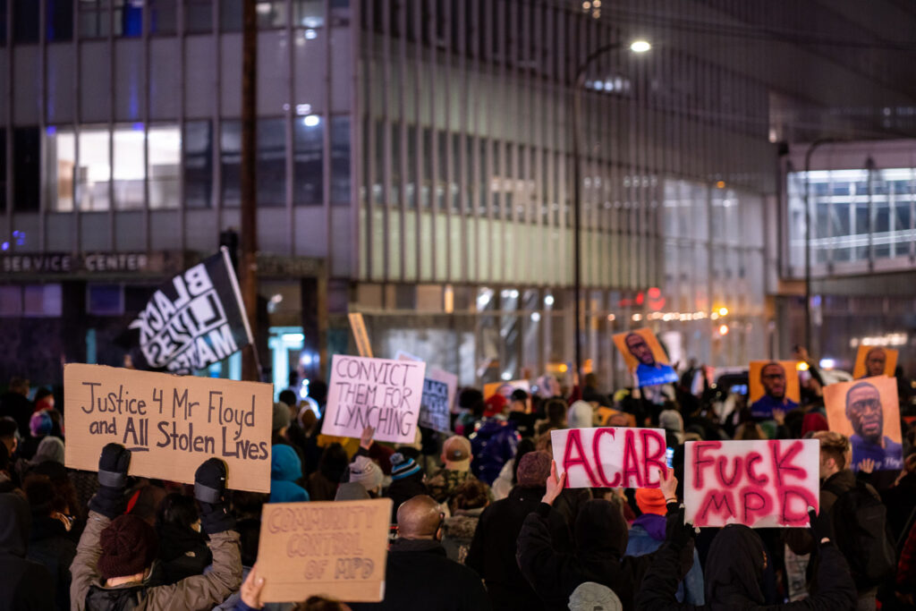 Protesters march through downtown Minneapolis during the Derek Chauvin murder trial.