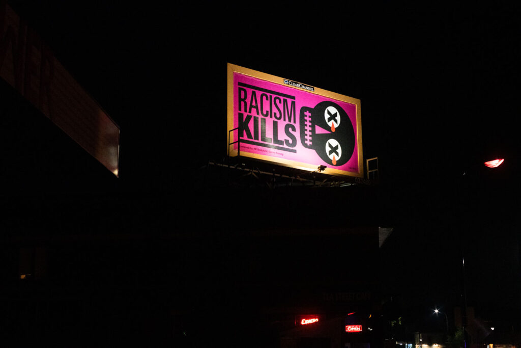 A billboard in George Floyd Square reading "Racism Kills".