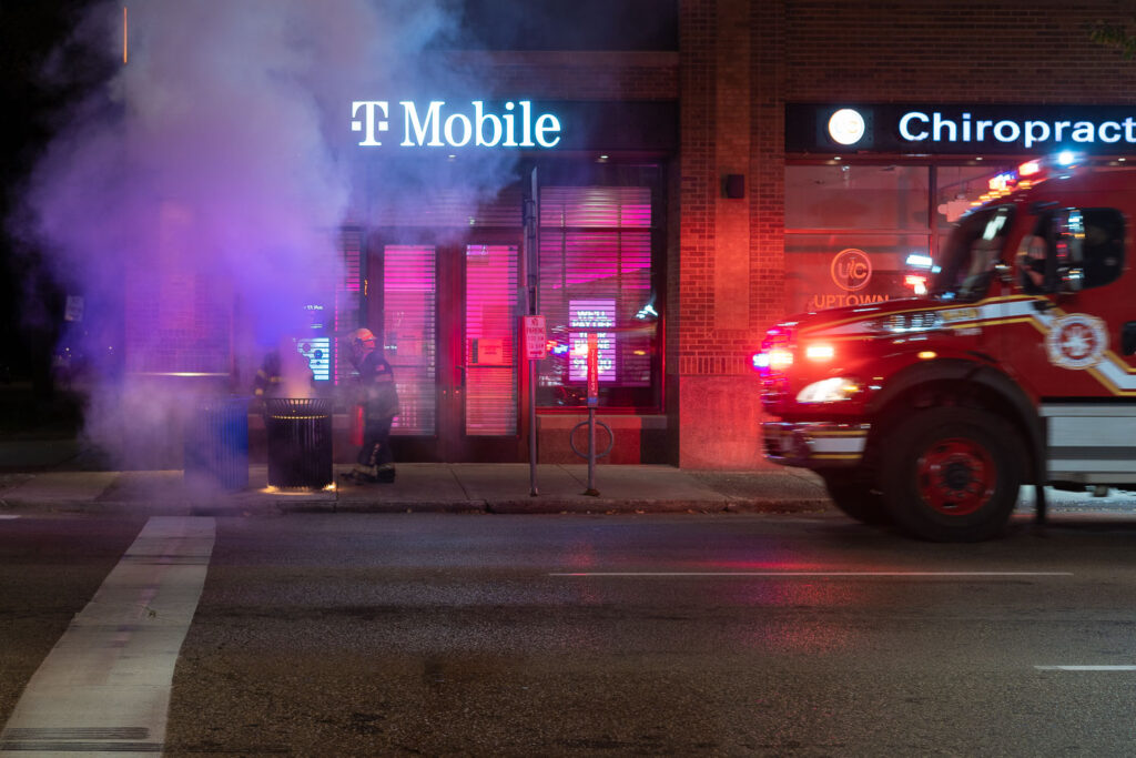 The Minneapolis Fire Department puts out garbage can fires on W. Lake Street in Uptown Minneapolis.