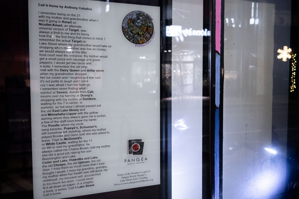 A poem written by Anthony Ceballos on a Hennepin Ave storefront.