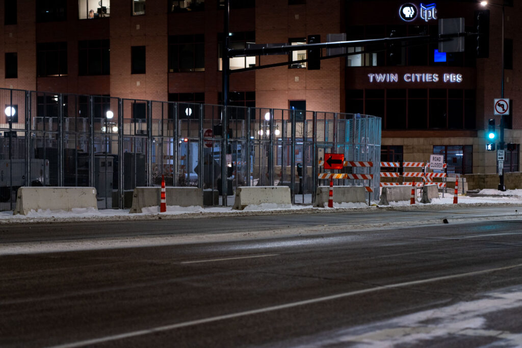 Security around the Warren E. Burger Federal Building in downtown St. Paul the night before opening statements in the trial of the officers accused of violating George Floyd's civil rights.