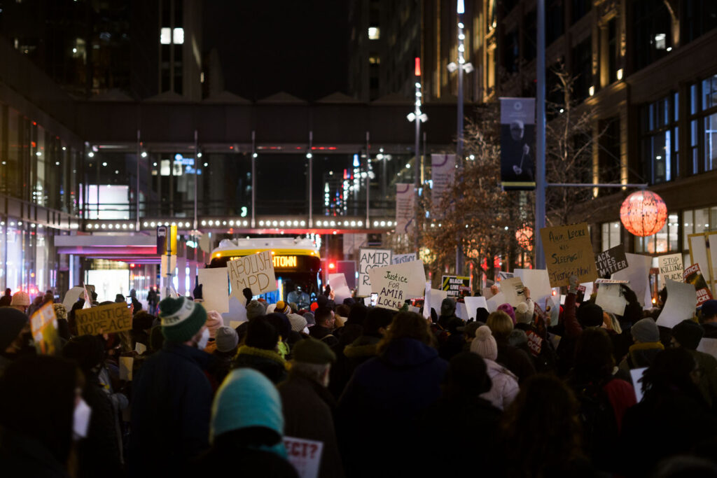 Protesters march through Downtown Minneapolis after demanding the Mayor resign following the Minneapolis Police shooting death of Amir Locke during a no-knock search warrant.