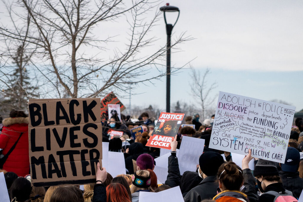 A student in St. Paul holds up a sign describing what abolishing the police means to her. The students walked out at noon today with many asking for the resignation of interim Minneapolis Police Chief Amelia Huffman and Minneapolis Mayor Jacob Frey.