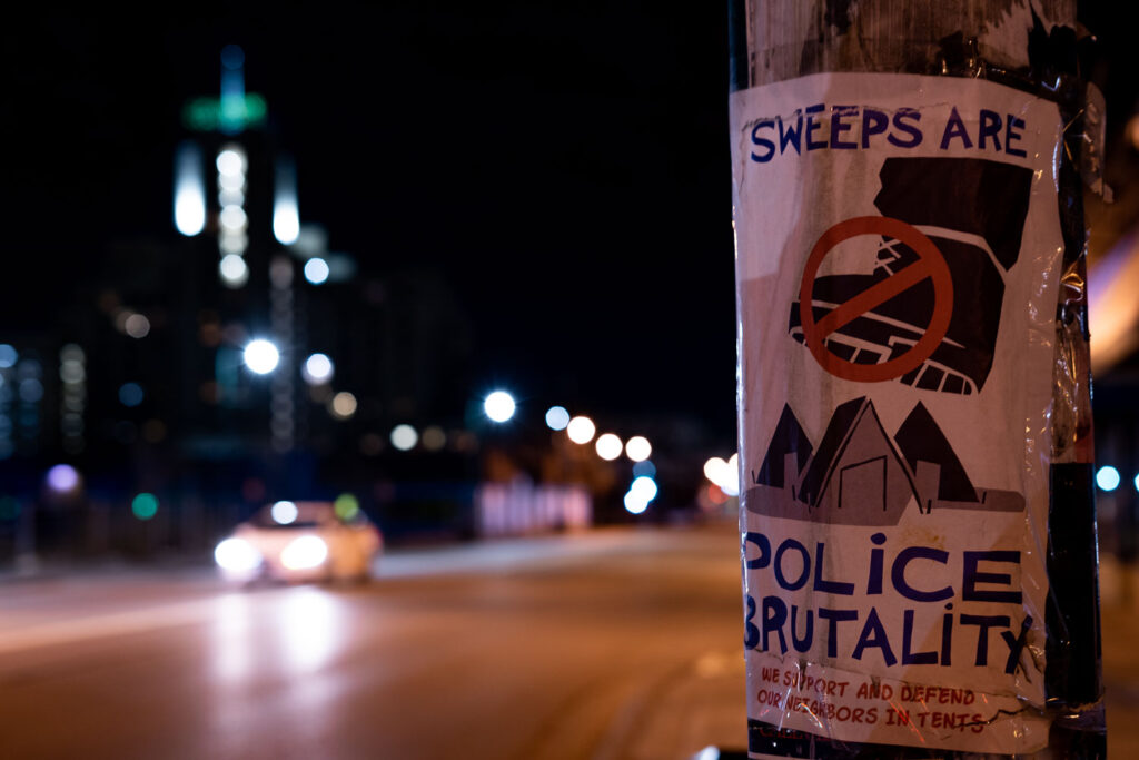 A flyer reading "Sweeps are police brutality" "We support and defend our neigbhors in tents" found in South Minneapolis.