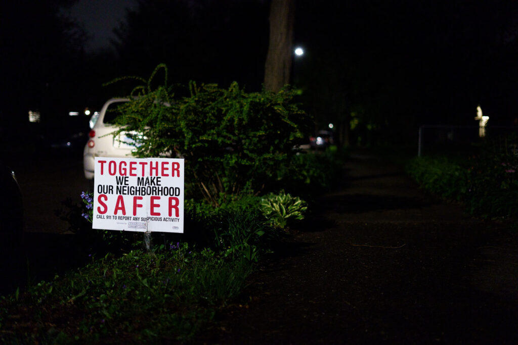 A yard sign reading "Together we make our neigborhod safer" in South Minneapolis.
