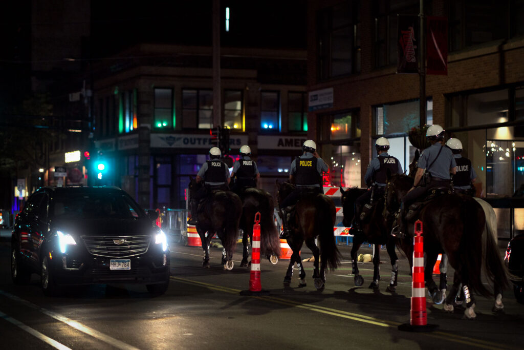 Minneapolis Police Mounted Patrol move through downtown Minneapolis.