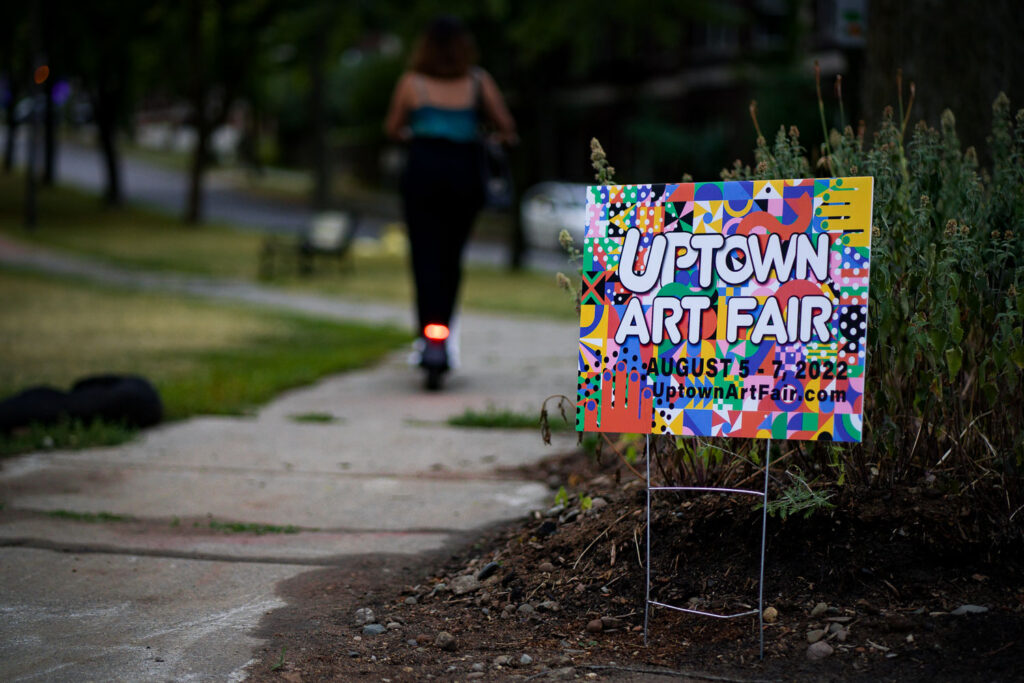An Uptown Art Fair yard sign in Uptown Minneapolis.