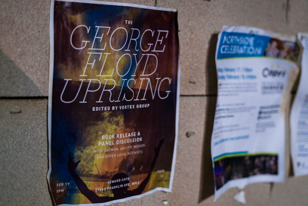 A flyer for "The George Floyd Uprising" book by "Vortex Group" seen at George Floyd Square on February 18, 2023.