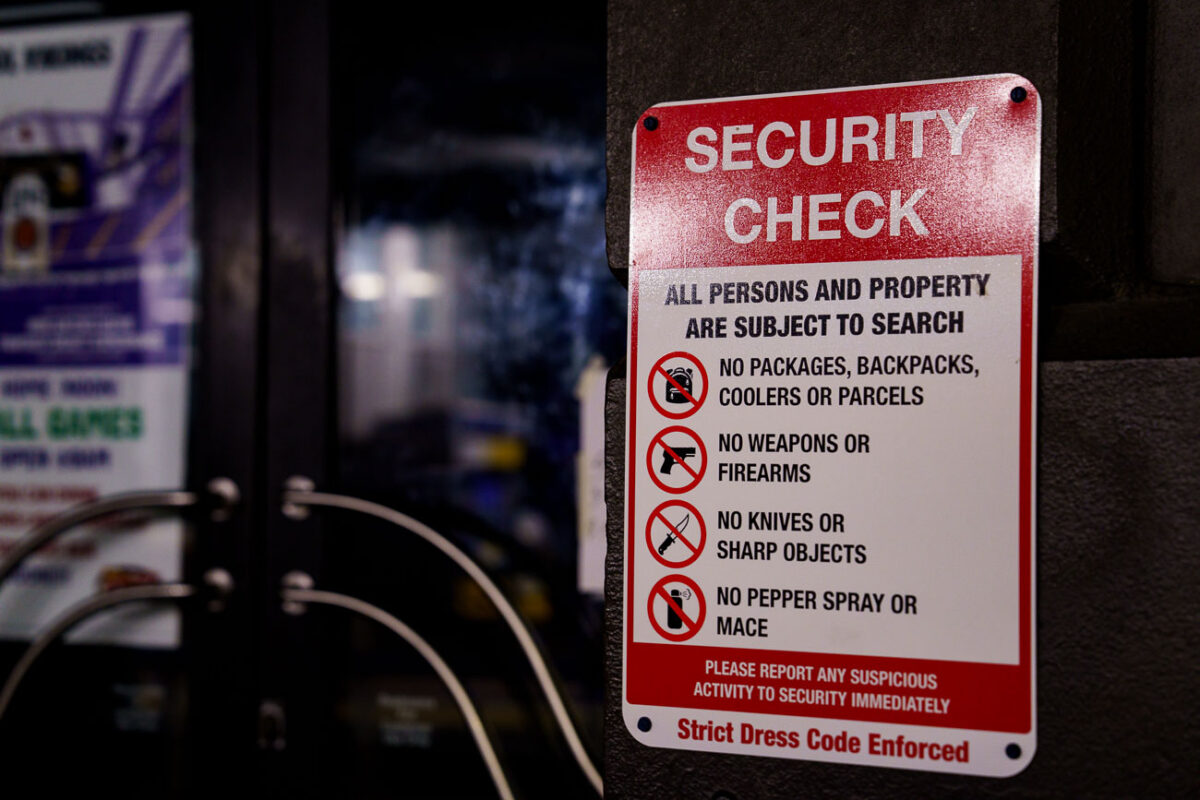 A security check sign outside a bar in downtown Minneapolis.