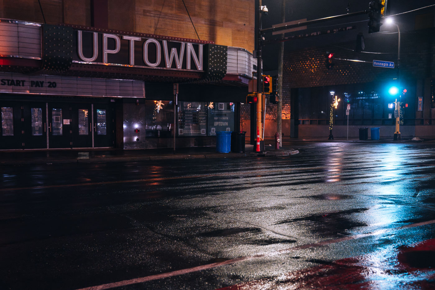 Dark Uptown Theater on rainy night