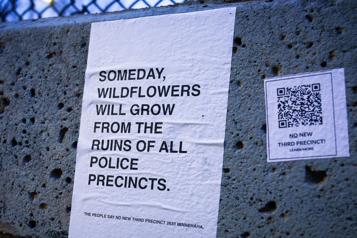 Flyers seen around the third precinct in South Minneapolis protesting the building of a replacement Minneapolis Police Third Precinct. Flyer reading "Someday, wildflowers will grow from the ruins of all police precincts".