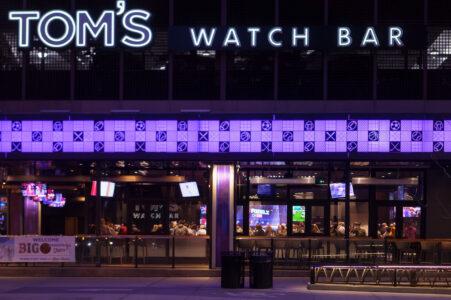 Large crowds at Tom's Watch Bar in downtown Minneapolis during the BIG Ten Tournaments.