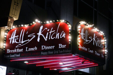 The lit up Hell's Kitchen sign on 9th Street in downtown Minneapolis.