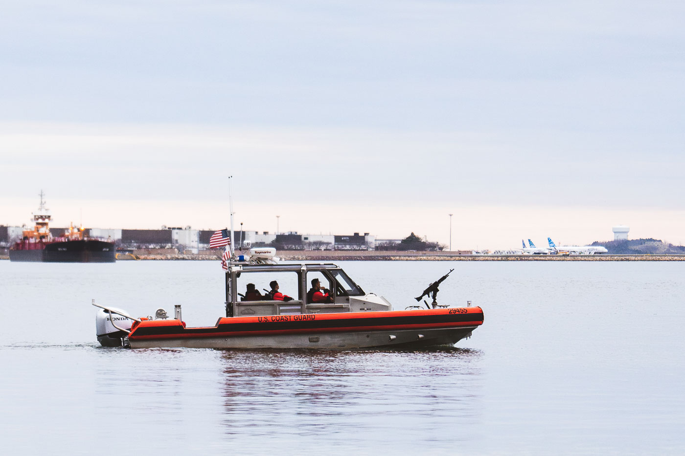 Coast Guard boat with mounted weapon