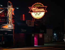 The Joint and Cabooze Bars in March 2020 during pandemic closures in Minneapolis. Marquee reads "It will get better"