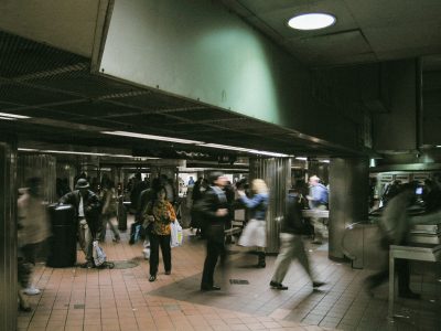 Rush-Hour Crowd at a Subway Turnstile Mezzanine, New York City