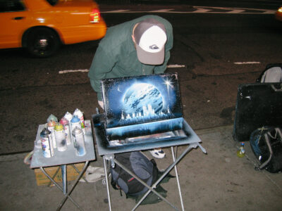 Street Artist Painting in Times Square, NYC
